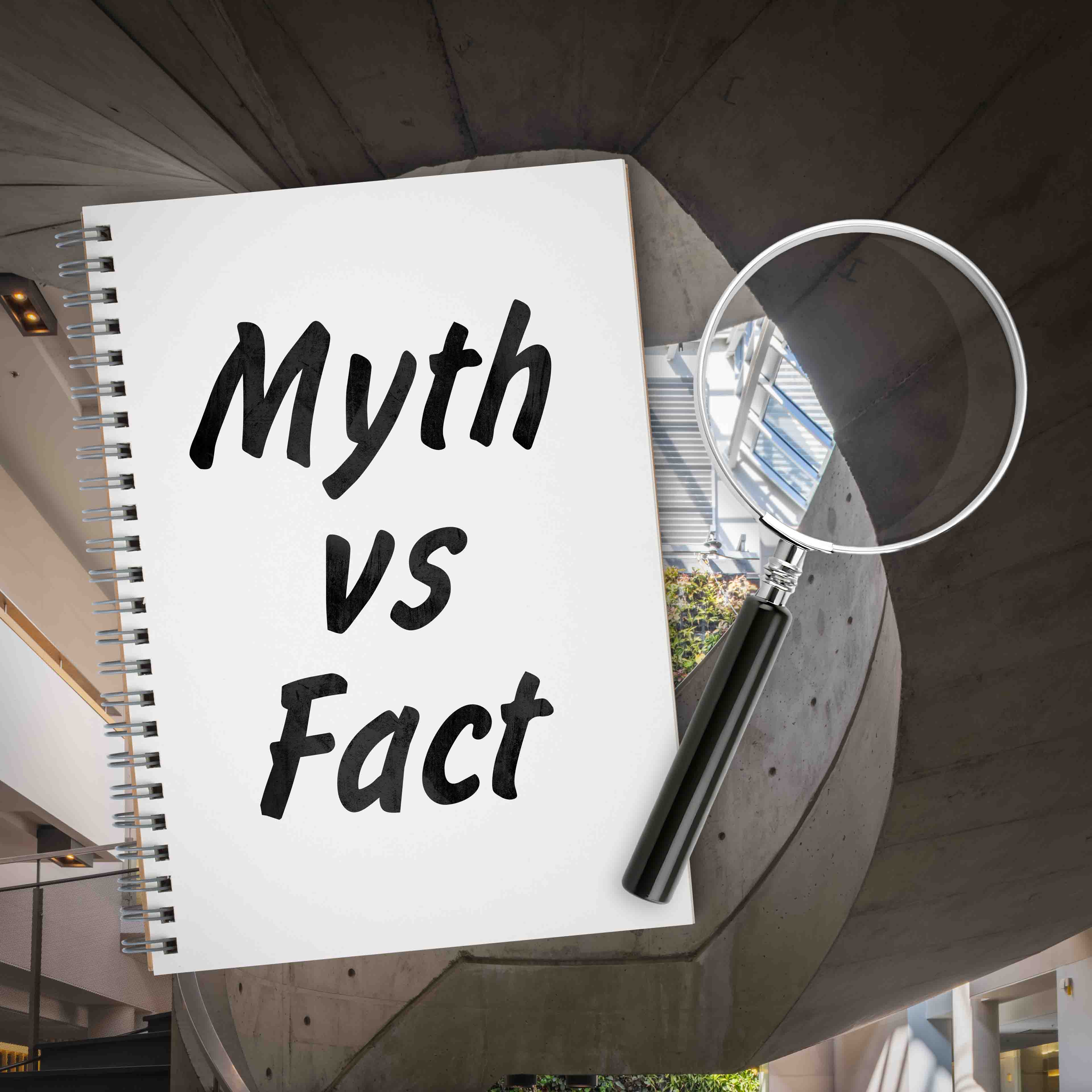 Journal with the words "myth vs fact" beside a magnifying glass