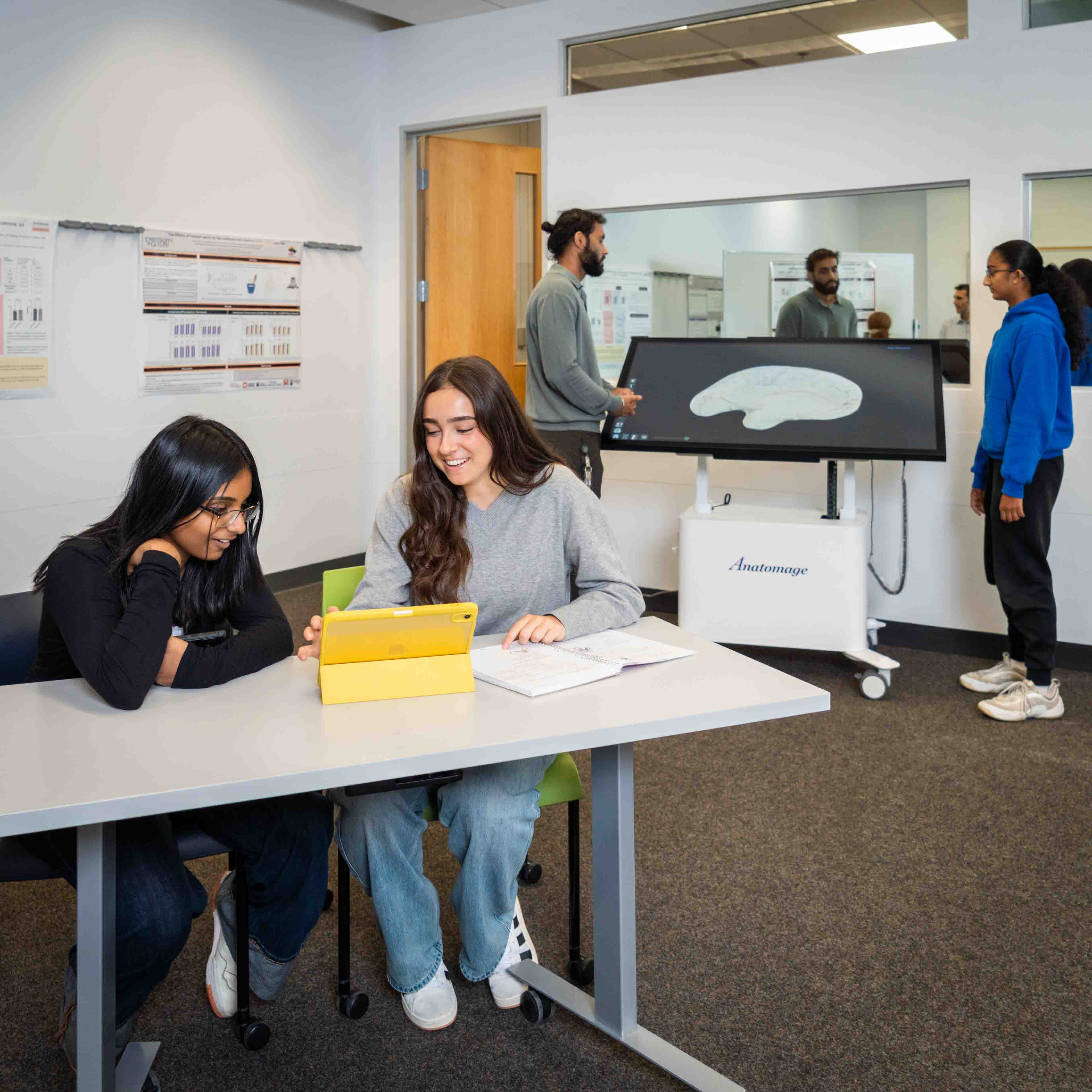 Six students collaborate in the Scholar's Hub