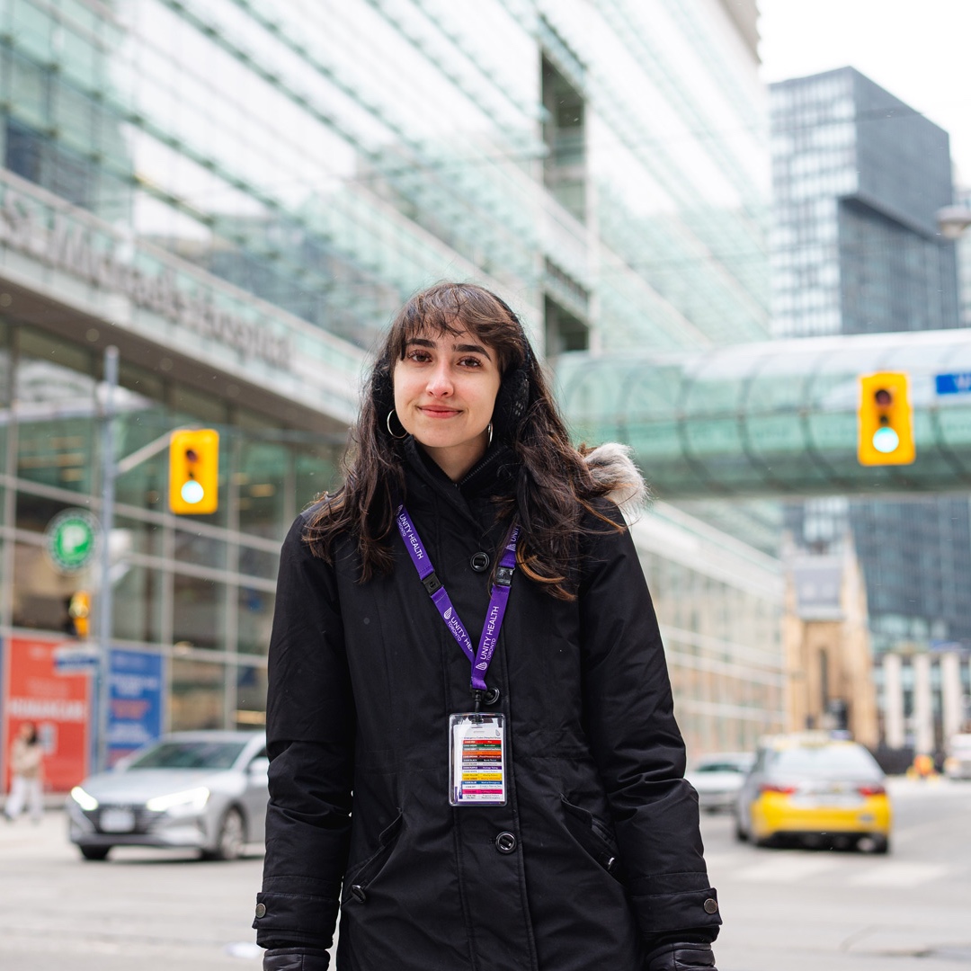 Anna Kiriakidis standing outside of St. Michael Hospital in Toronto, Ontario