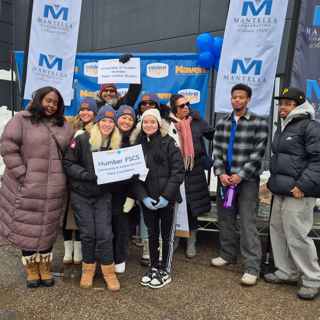 A group of ten participants from the University of Guelph-Humber and Humber Polytechnic pose for a photo at the Coldest Night of the Year fundraiser