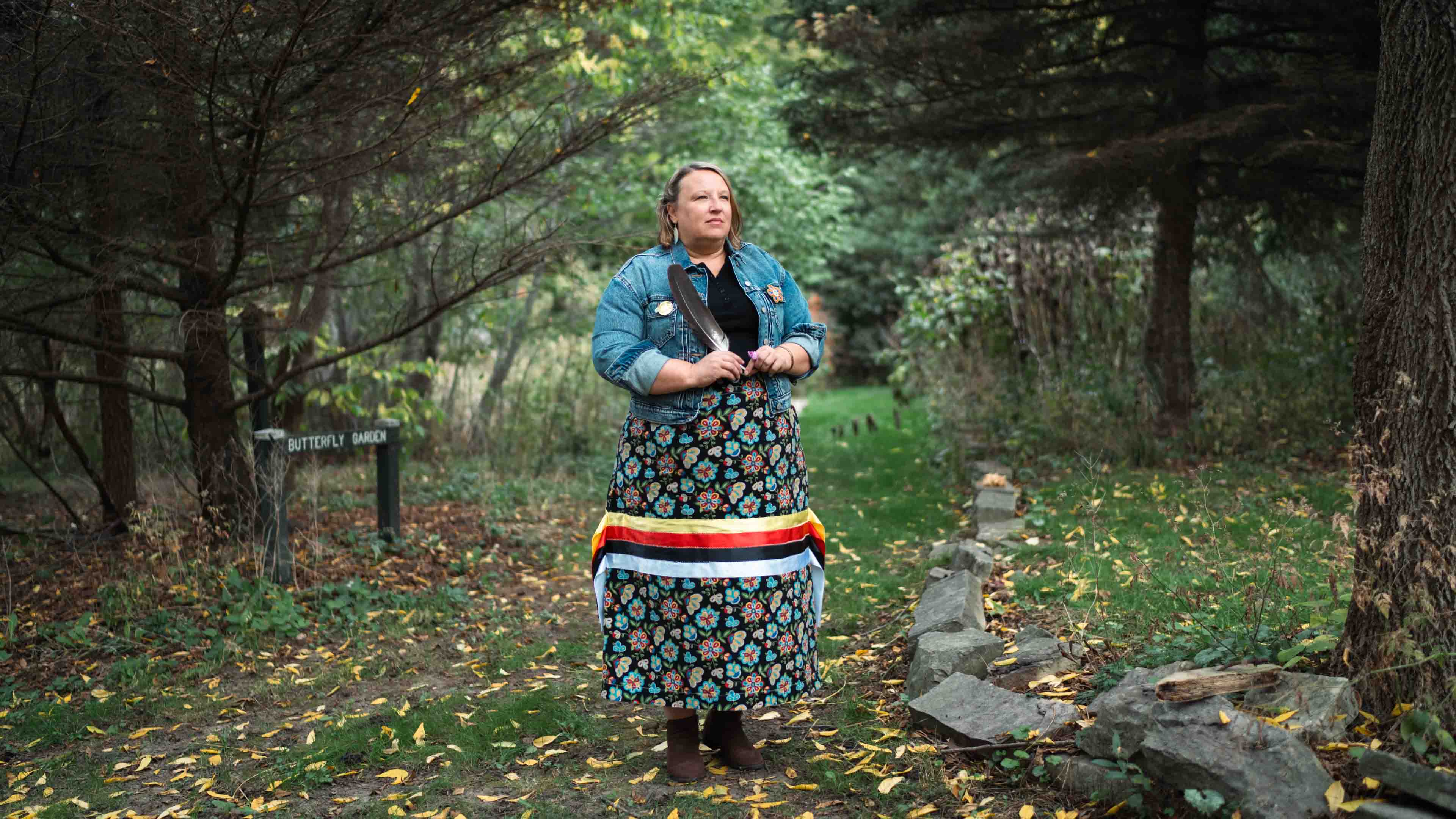 Maya-Rose Simon wears her ribbon skirt in the Humber Arboretum
