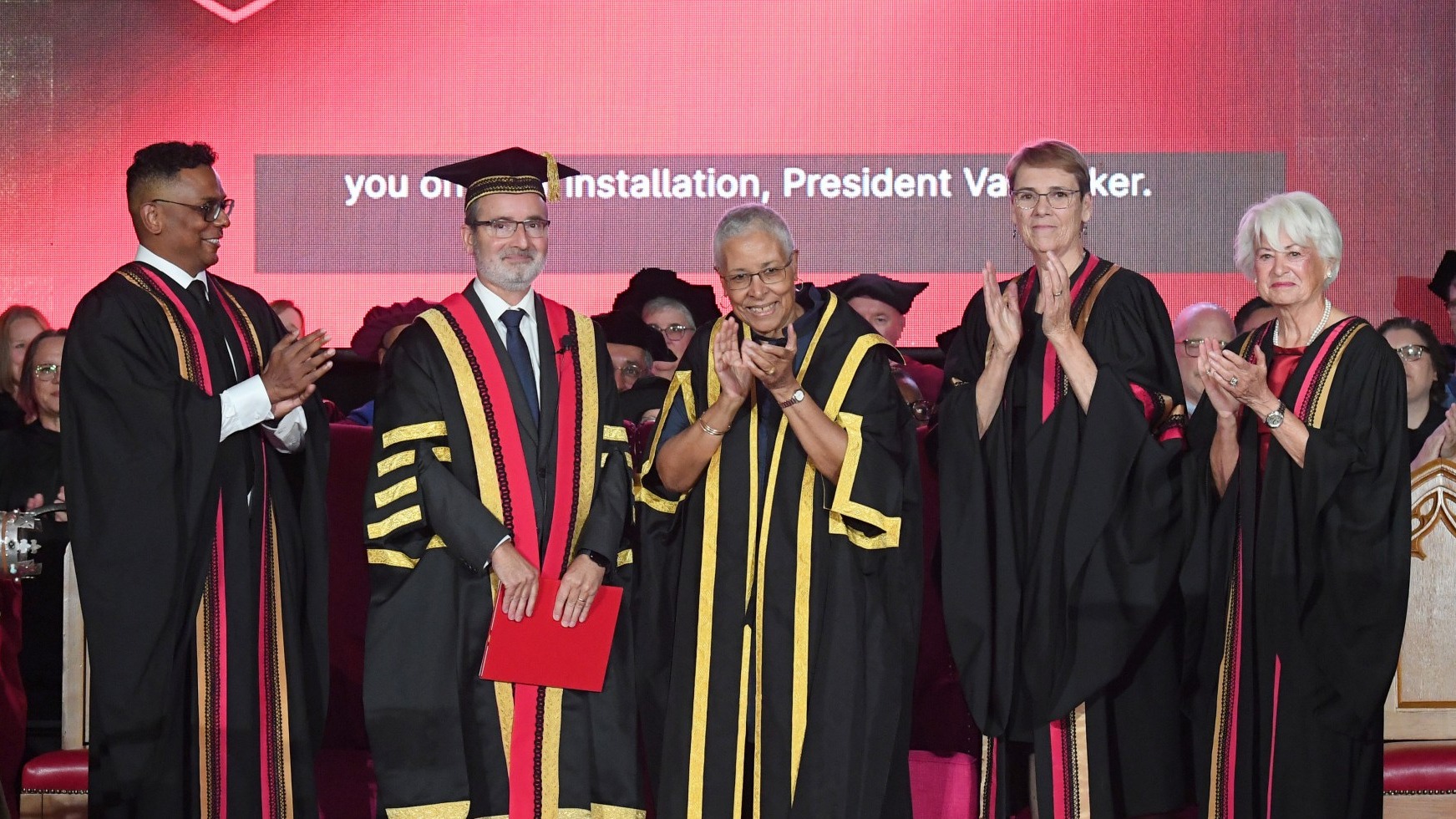 Dr. Van Acker at U of G convocation with four other people in academic regalia