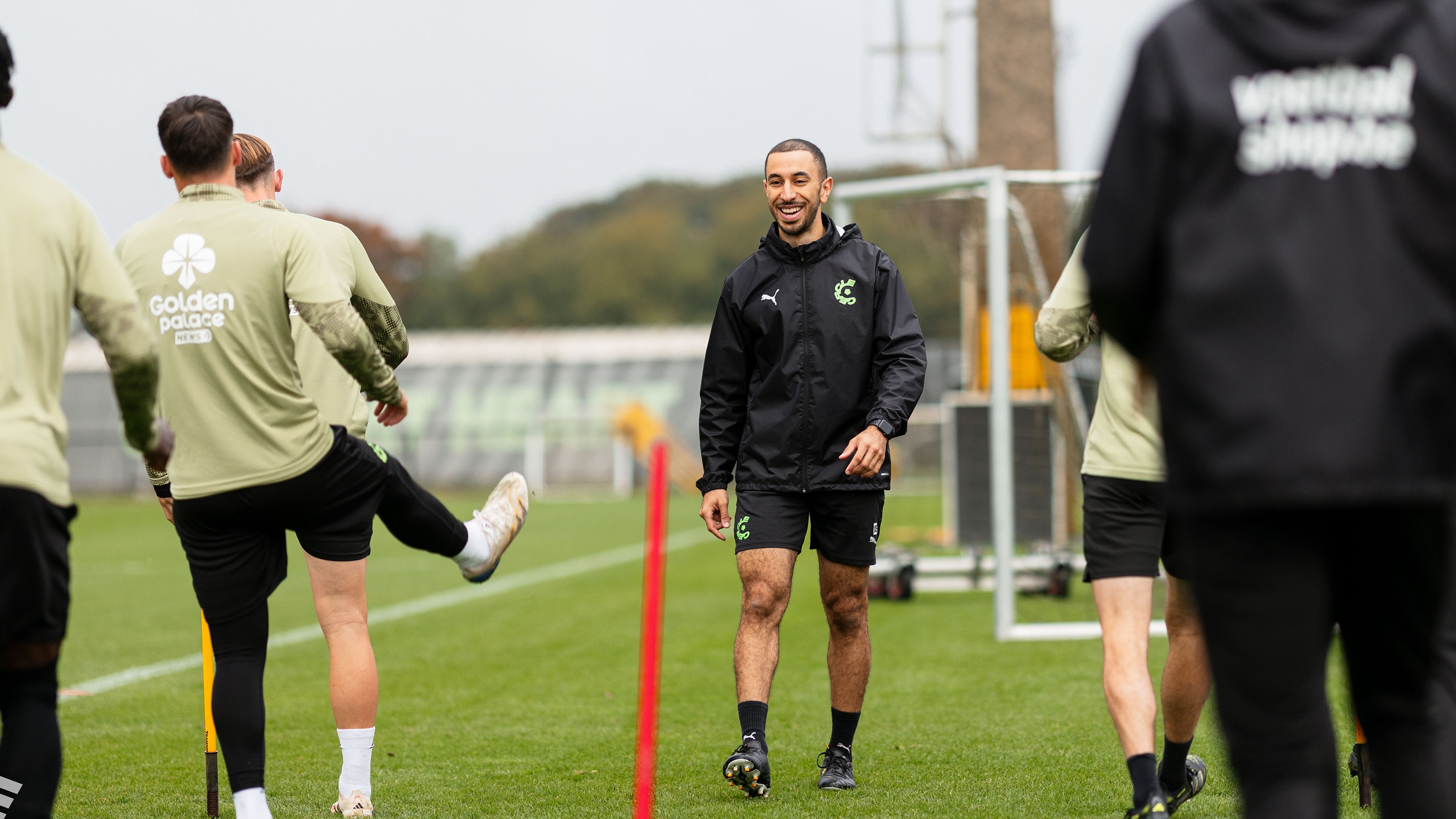 Imad Shaker is with players training on the field