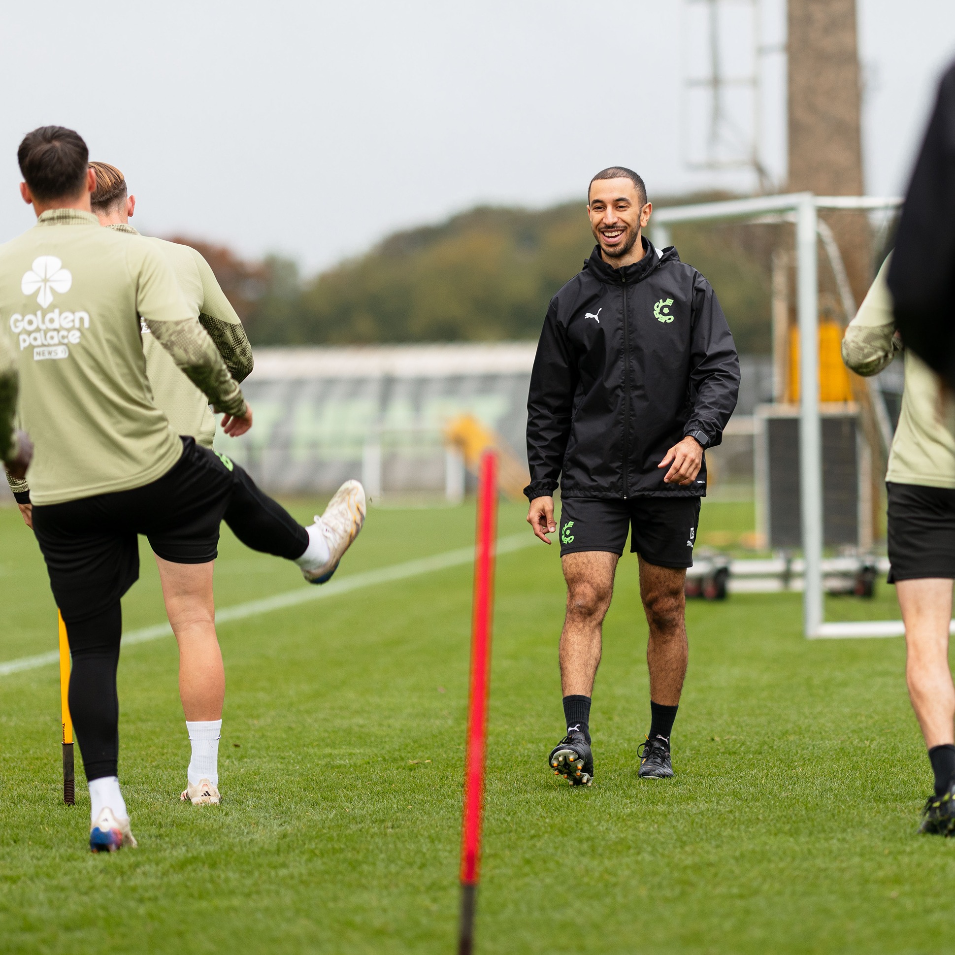 Imad Shaker is with players training on the field