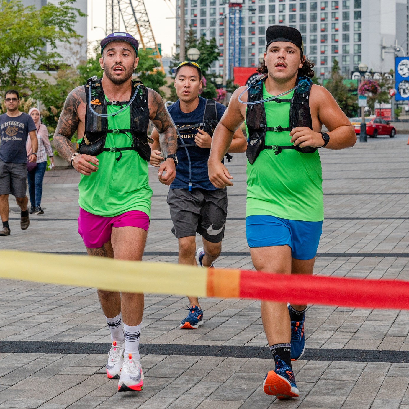 James Robb-Kennedy and his companions cross the finish line in Toronto after running their ultramarathon