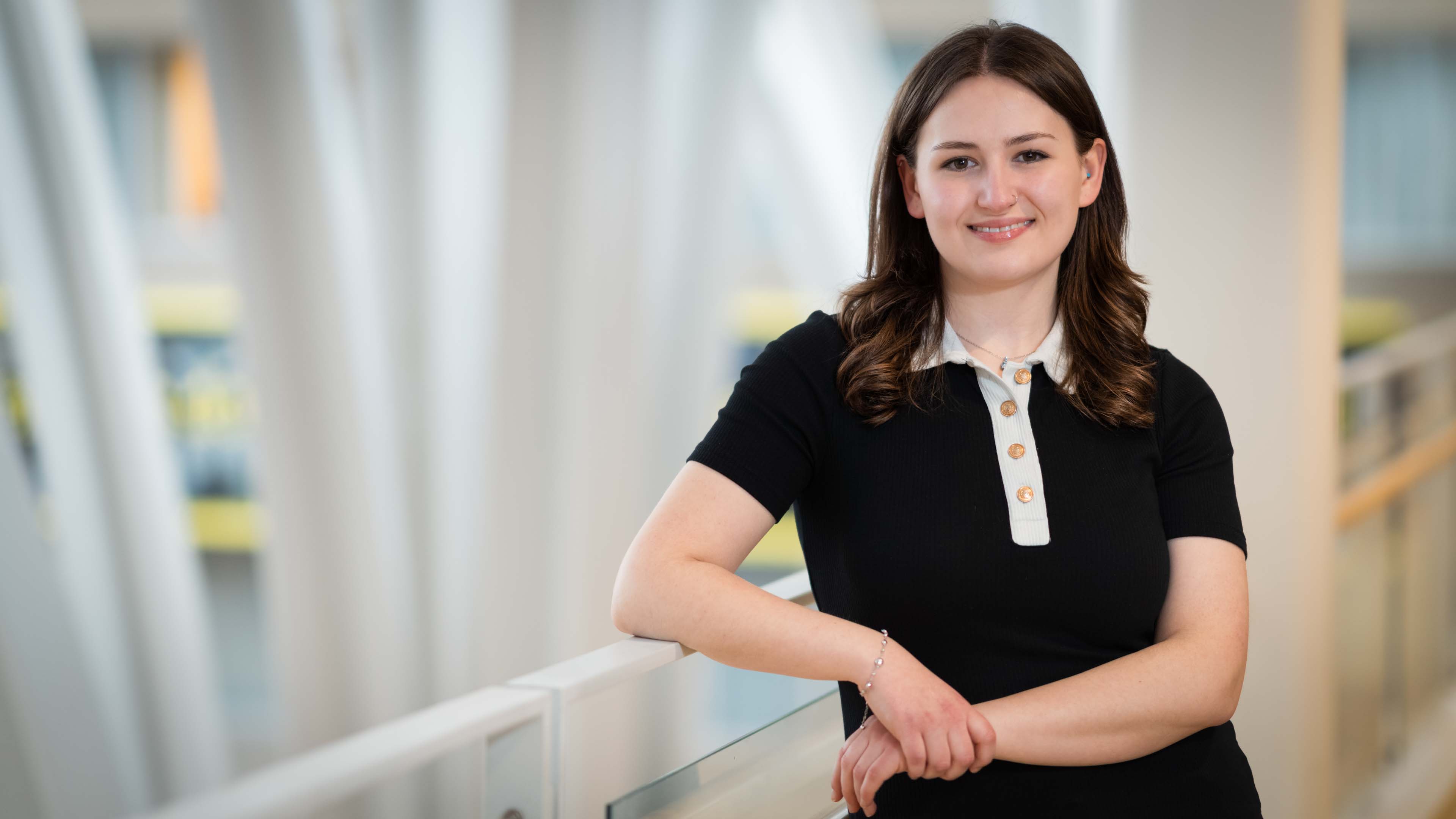 Sydney Lytwyn leans on a railing