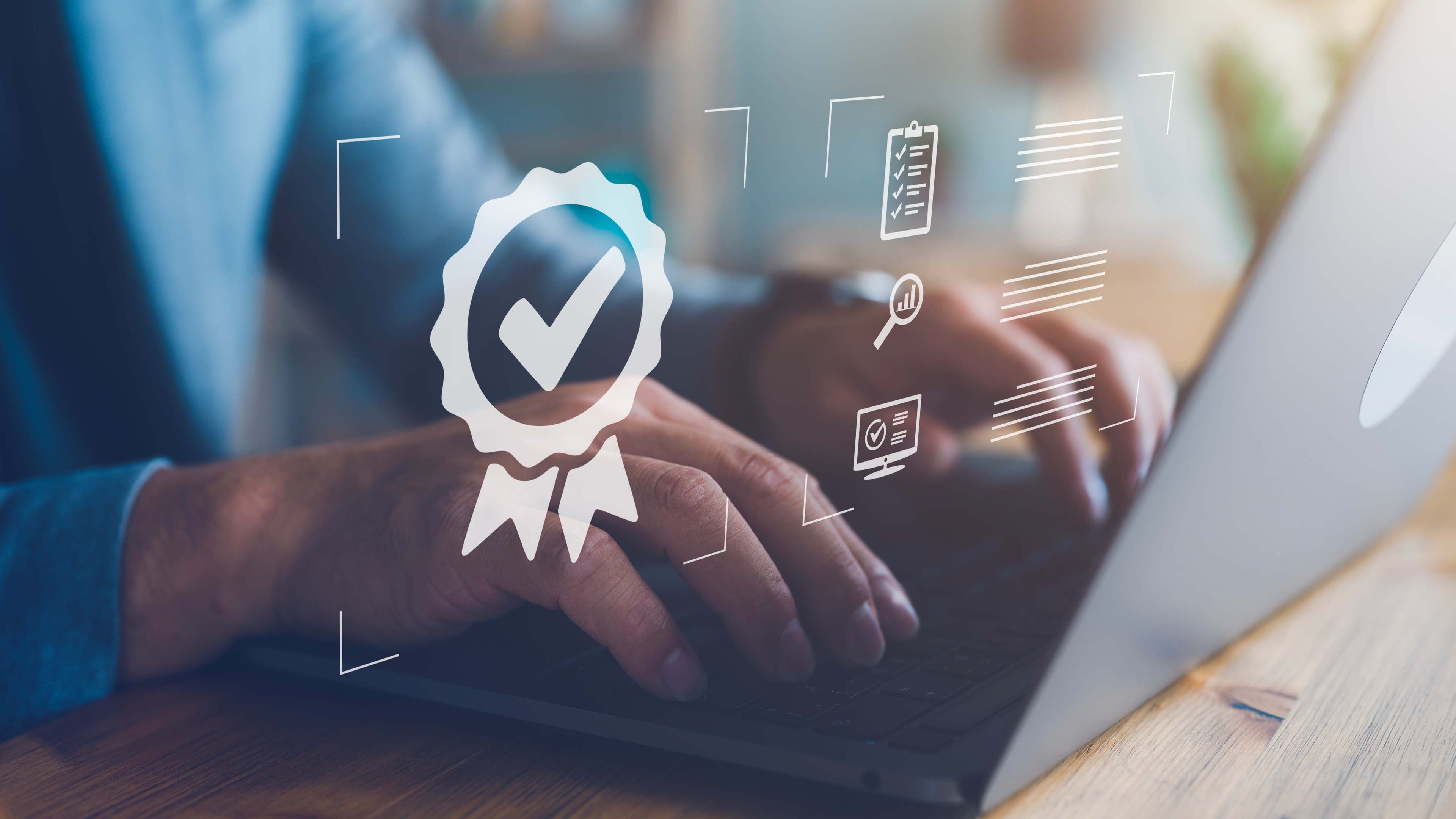 Person types on a laptop with a checkmark and other symbols overtop