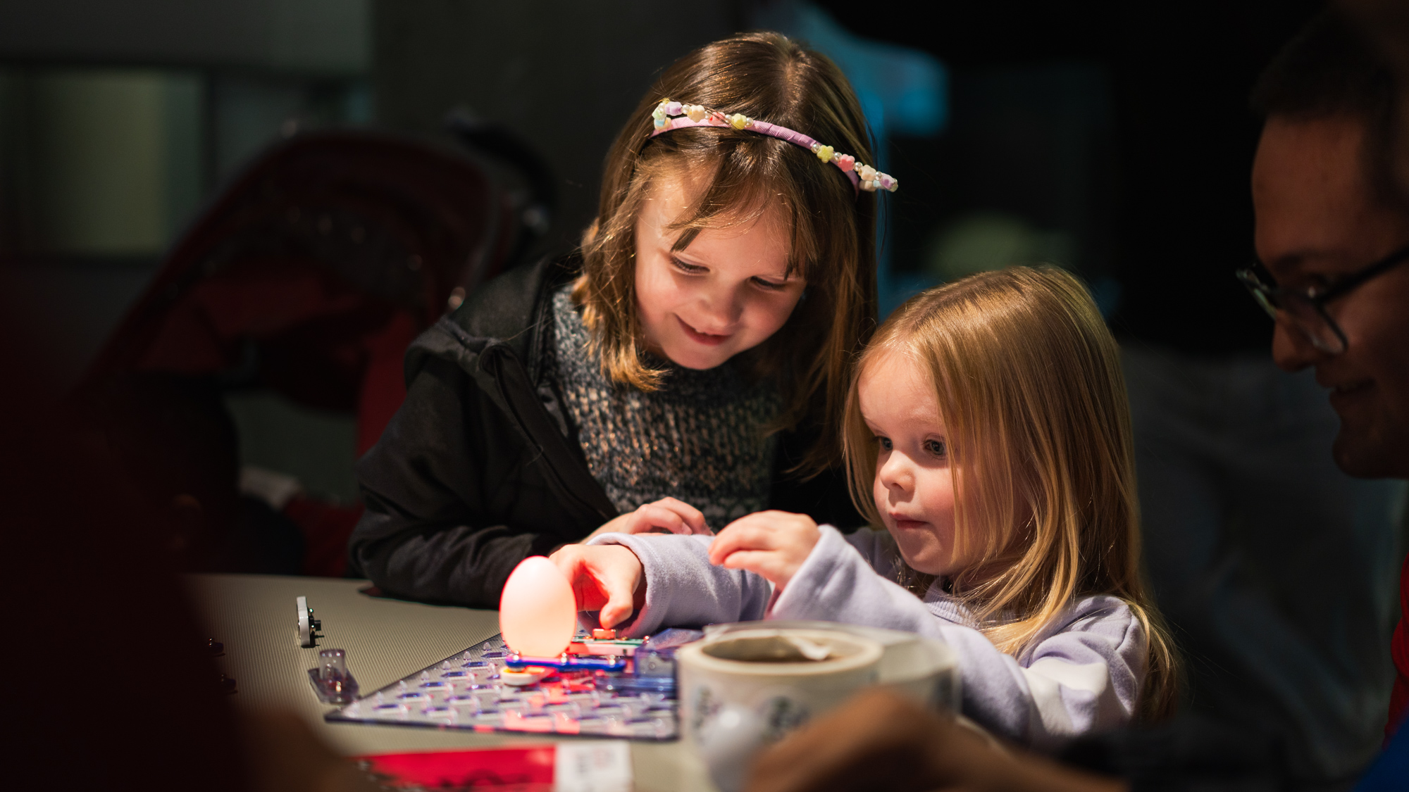 Two children look at an interactive exhibit at Science Rendezvous 2026