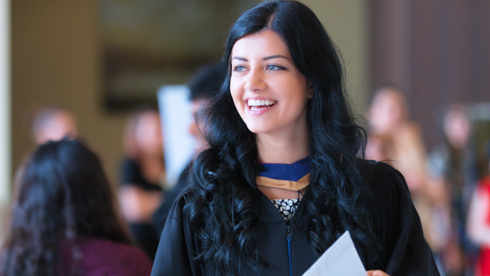 Smiling student at convocation 2014