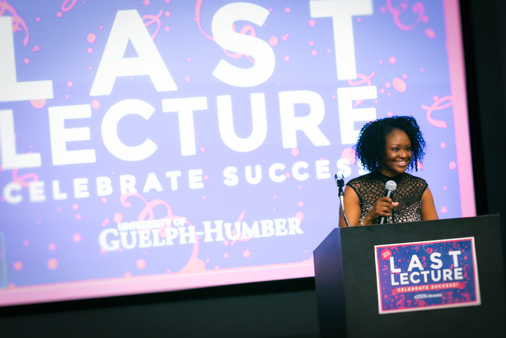 Host Laura Josephs addresses the audience at Last Lecture