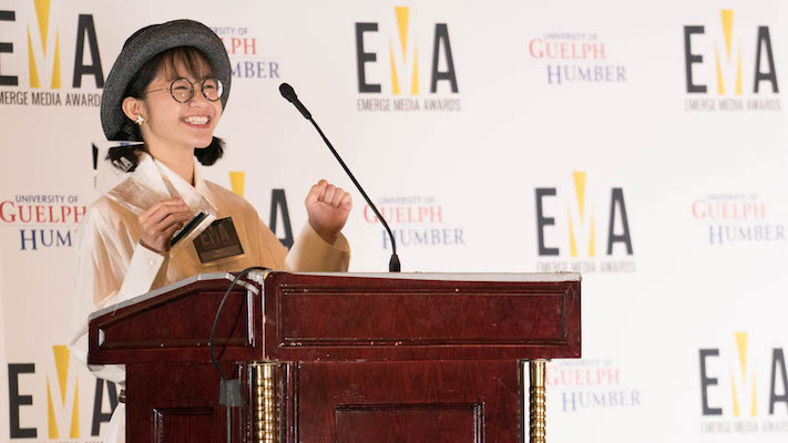 EMA winner accepts award