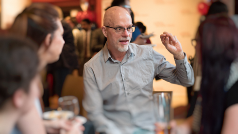 Dr. Greg Kelley speaking with alumni