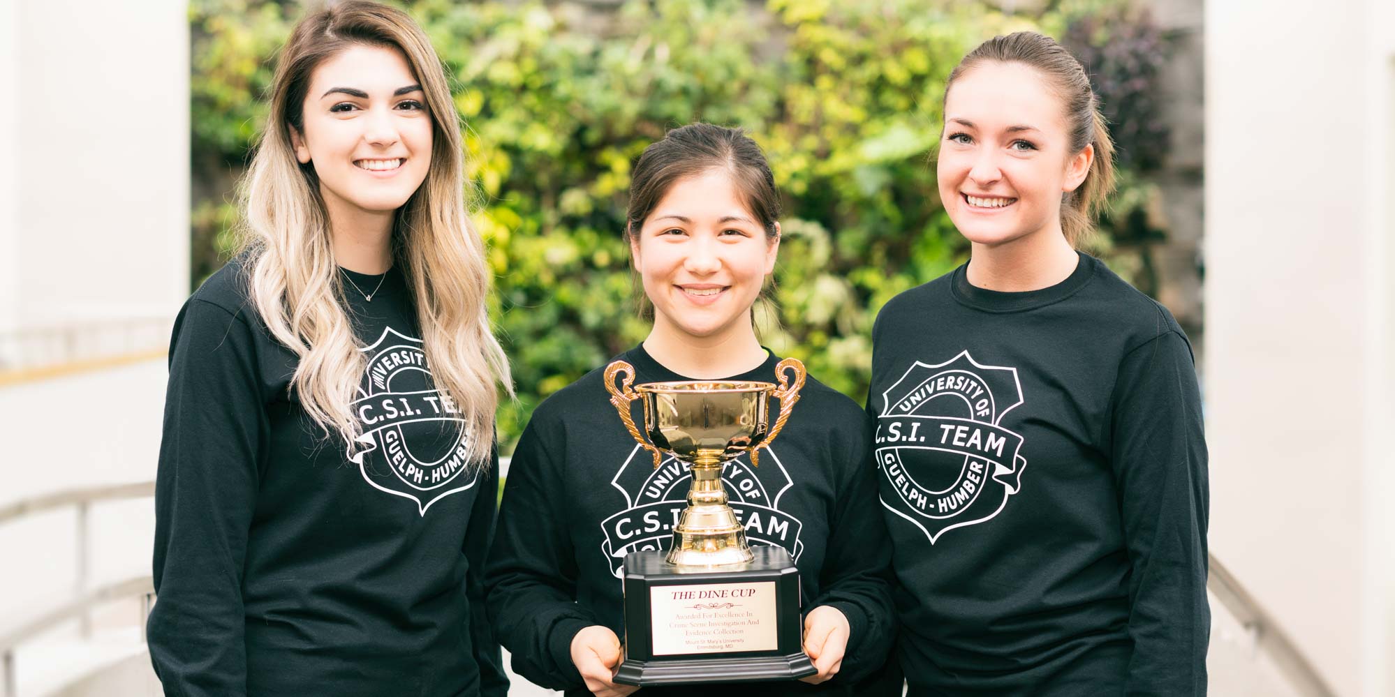 Winning UofGH team poses with their trophy