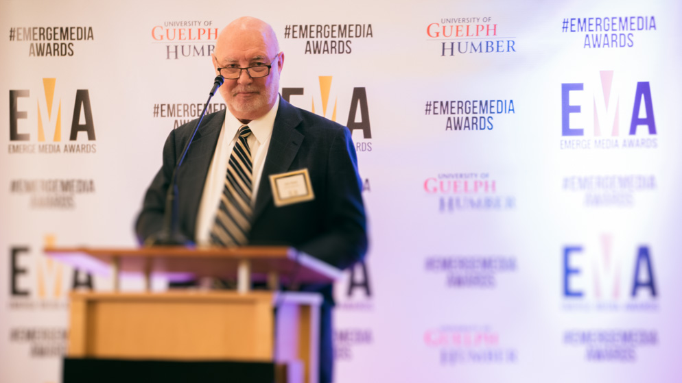 Man giving speech at podium_