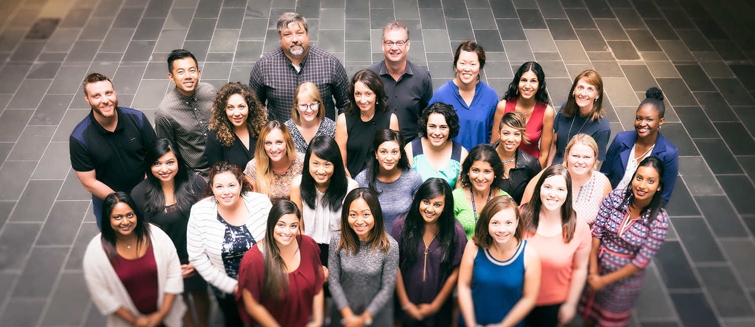 Student Services standing in the UofGH auditorium