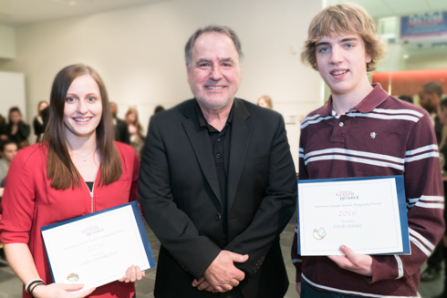 Program Head Jerry Chomyn stands with the 1st and 3rd place winners.