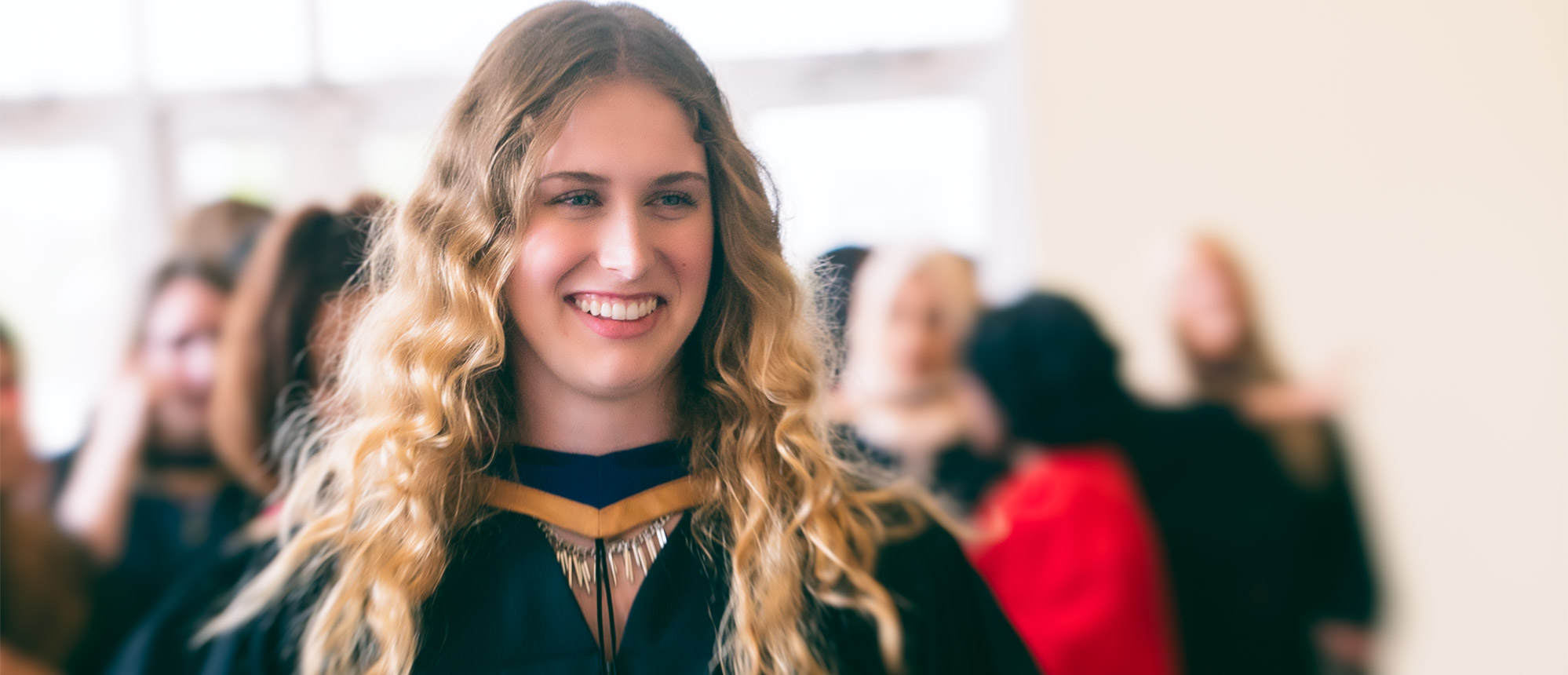 Rachel Dykes smiles at convocation