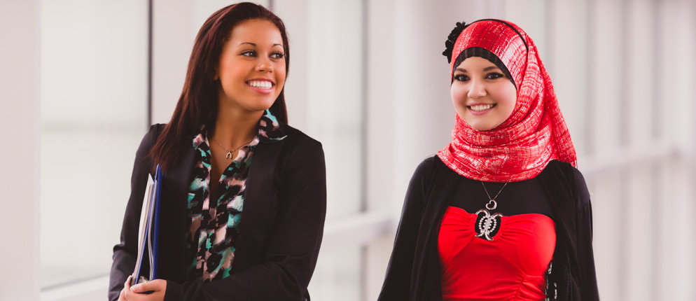 Two female students at UofGH